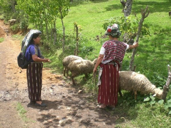 Discussing community funds in Chuché, Nebaj
