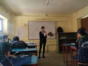 Sarathis demonstrating menstrual hygiene products