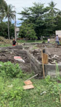 backfilling the area to make it ready for concrete