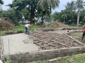 pouring of cement for the concrete foundation