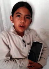 Girl excited after receiving her tablet