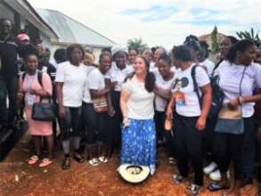 Kelly Dore with Migrants