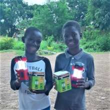 Makeni children with new solar lamps