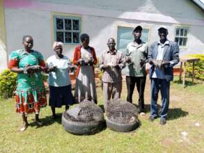 Group receiving chicks for income generating
