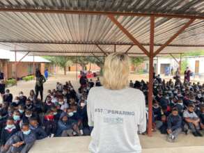 Adine addressing the school learners
