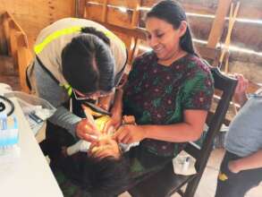 Doctor checks the baby