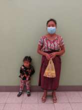 The youngest artisan receiving her medicine.