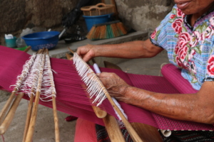 The art of weaving on a backstrap loom.