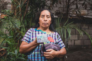 Marcela receiving her 2023 health card