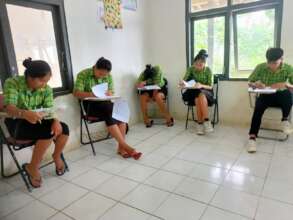 Students taking mid-term assessments