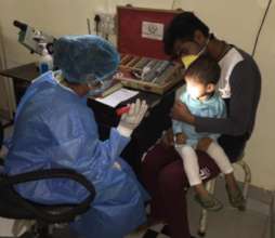 Pooja Examines a Young Patient