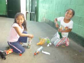 Local school kids making eco-bricks
