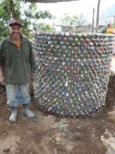 Beneficiary next to his cistern