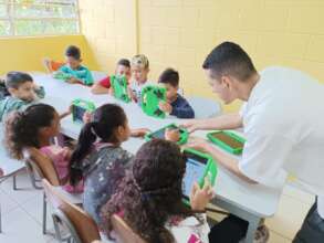 Mickael teaching Arca do Saber children