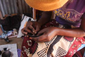 Millicent working on soapstone pieces
