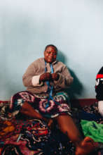 Mwanaidd making bracelets in our workshop in Kenya