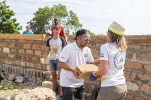 Volunteers constructing classrooms