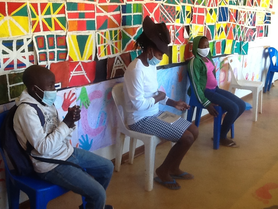 Kids & caregivers waiting for medical checkups