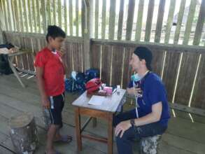A doctor introducing himself to a young patient