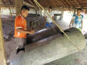 A resident plays the "manguare" traditional drums