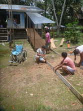 Building a wheelchair ramp, Apayacu River, Peru