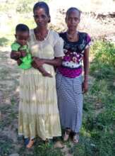 Selam with her older sister with child