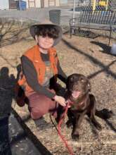 Trainer Harleigh with newly adopted Molly