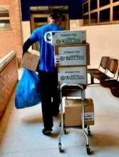 A Wayuu Taya volunteer delivers a donation.