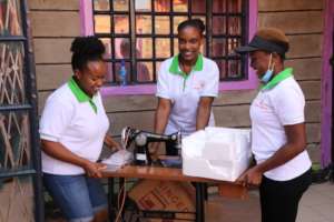 Our interns receive a sewing machine donated to us