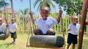 Having fun on the swings