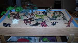 SAND TRAYS DISPLAY A CHILDS VIEW OF THEIR WORLD.