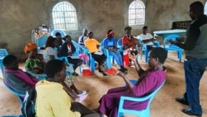 Deaf participants helped by interpreter in Namgoi