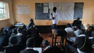 UR Youth Participant Presenting at Junior Sec Sch