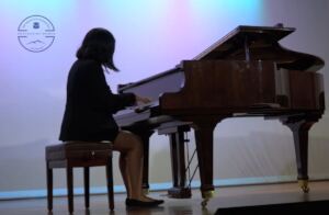 Lupita giving a piano concert