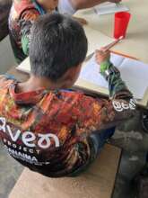 One of our students in Canaima, with his new shirt