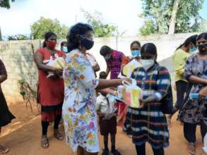 Distributing Multi-vitamin, Iron & Worming Tablets