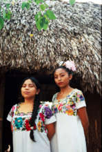 Maya Girls in Front of Traditional Maya House