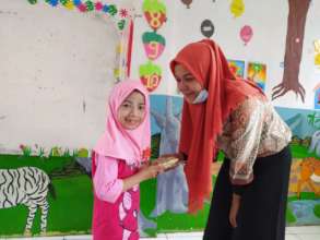 Foodbank distributing bread for children