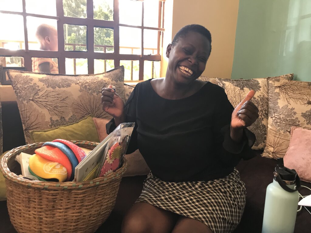 Teacher Ann excited to receive gifts for the girls