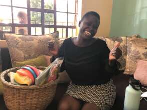 Teacher Ann excited to receive gifts for the girls