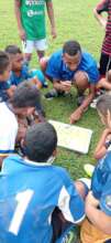 Anderson teaching soccer tactics