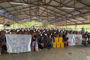 Karen students holding up their new JuniorBuddy li