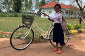 Khnar Krav Primary School student & her new light