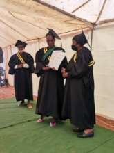 Ikemele graduate receives her training certificate