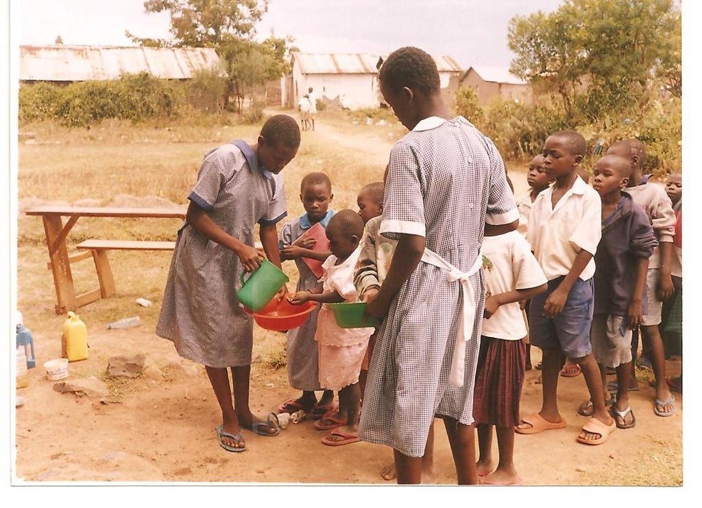 Give orphans in kisumu slums food and clothing.