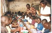 Give orphans in kisumu slums food and clothing.