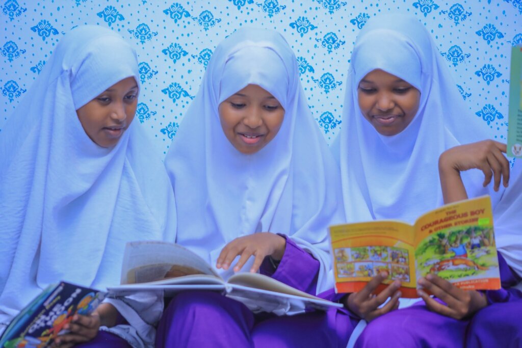 photos of the girls smiling and studying