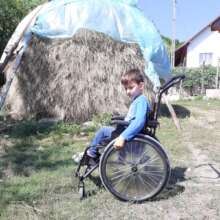 Luca-Timotei is a happy childin his new wheelchair