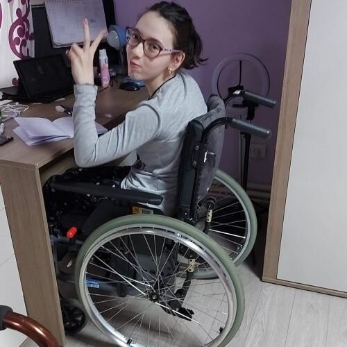 Otilia in her new wheelchair