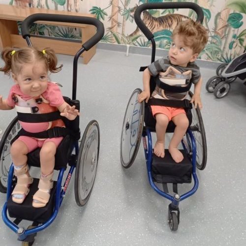 Galina and Mihai in their new wheelchairs